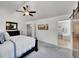 This main bedroom is spacious and includes a ceiling fan at 10388 Lions Path, Lone Tree, CO 80124