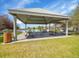 Outdoor pavilion with picnic tables, offering a shaded area for gatherings and relaxation at 10388 Lions Path, Lone Tree, CO 80124