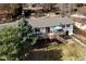 Aerial view of the home featuring a multi-level deck and a lush backyard, perfect for outdoor living and entertaining at 12739 W Alabama Pl, Lakewood, CO 80228