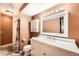 This renovated bathroom boasts a modern vanity and an updated shower at 16259 W 10Th Ave # K1, Golden, CO 80401
