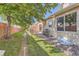 The backyard features a private patio, perfect for entertaining outdoors at 2417 S Racine Way, Aurora, CO 80014