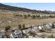 Aerial view showing the property's neighborhood and surrounding landscape at 7139 Pine Hills Way, Littleton, CO 80125