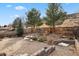 Spacious backyard with patio, providing ample outdoor space at 7139 Pine Hills Way, Littleton, CO 80125