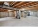 Unfinished basement offering potential for future expansion and storage at 7139 Pine Hills Way, Littleton, CO 80125