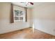 Bedroom with hardwood floors and a window with view at 7139 Pine Hills Way, Littleton, CO 80125