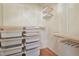 Large walk-in closet with shelving and drawers at 7139 Pine Hills Way, Littleton, CO 80125
