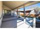 Inviting outdoor patio area, perfect for entertaining with elegant decking and a secure gated entry at 2601 S Quebec St # 6, Denver, CO 80231