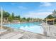 Outdoor swimming pool with clear blue water and ample space for relaxation and recreation at 8335 Deframe Ct, Arvada, CO 80005