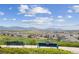 Scenic community view showcasing the expansive landscape and mountain backdrop at 8335 Deframe Ct, Arvada, CO 80005