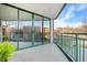 Spacious balcony with glass doors and city views at 550 E 12Th Ave # 204, Denver, CO 80203