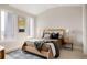 Bright bedroom with multiple windows, natural lighting, and a modern decor at 8280 E 36Th Ave # 26, Denver, CO 80238