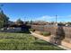 A backyard features manicured landscaping, providing a serene outdoor space at 12604 Madison Way, Thornton, CO 80241