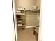 Walk-in closet featuring shelving and ample storage space at 12604 Madison Way, Thornton, CO 80241