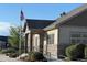 An inviting community clubhouse features well maintained landscaping and accessible entrance ramps at 12604 Madison Way, Thornton, CO 80241