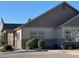 A clubhouse with stone accents features a well-maintained exterior and accessible parking at 12604 Madison Way, Thornton, CO 80241
