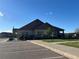 The attractive community clubhouse features stone accents and a well maintained parking area at 12604 Madison Way, Thornton, CO 80241