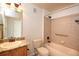 Bathroom with granite vanity, toilet, and bathtub at 8182 S Winnipeg Ct, Aurora, CO 80016