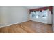 Spacious bedroom with hardwood floors and ample natural light at 8182 S Winnipeg Ct, Aurora, CO 80016