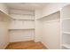 Large walk-in closet with ample shelving and hanging space at 8182 S Winnipeg Ct, Aurora, CO 80016