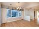 Bright dining room with hardwood floors and large windows at 8182 S Winnipeg Ct, Aurora, CO 80016