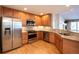 Modern kitchen with stainless steel appliances and granite countertops at 8182 S Winnipeg Ct, Aurora, CO 80016