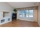 Spacious living room featuring hardwood floors and fireplace at 8182 S Winnipeg Ct, Aurora, CO 80016