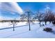 Peaceful winter scene overlooking a snow-covered golf course at 8182 S Winnipeg Ct, Aurora, CO 80016