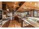 Gourmet kitchen featuring wooden cabinets, stainless steel appliances, and quartz countertops at 23 Verde Ct, Breckenridge, CO 80424