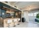 Kitchen with an island, stainless steel appliances, and bright, modern lighting at 675 S University Blvd # 106, Denver, CO 80209