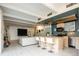 Open concept living room featuring kitchen and dining area at 675 S University Blvd # 106, Denver, CO 80209