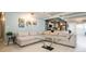 Living room showcases open concept with kitchen and modern decor at 675 S University Blvd # 106, Denver, CO 80209