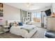 Cozy bedroom with large window, white furniture, and stylish décor at 11545 S Flower Mound Way, Parker, CO 80134