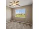 Bedroom with large window that has picturesque views of open prairie at 11545 S Flower Mound Way, Parker, CO 80134