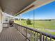 Covered deck with serene views, perfect for relaxing or entertaining at 11545 S Flower Mound Way, Parker, CO 80134