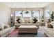 Comfortable living room with large view windows and plants at 11545 S Flower Mound Way, Parker, CO 80134