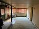 The basement offers versatile space with carpet flooring and functional windows for natural light at 1337 Valentia St, Denver, CO 80220