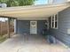Covered carport offering parking and protection from the elements at 1337 Valentia St, Denver, CO 80220