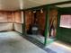Living room featuring a fireplace, tile accents, and natural light from the windows at 1337 Valentia St, Denver, CO 80220
