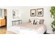 Comfortable bedroom featuring a stylish mirror and soft, neutral tones at 3534 Decatur St, Denver, CO 80211
