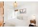 Comfortable bedroom featuring neutral tones, soft bedding, and stylish decor at 3534 Decatur St, Denver, CO 80211