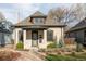 Charming single-Gathering home featuring light brick and well-maintained landscaping at 3534 Decatur St, Denver, CO 80211