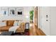Cozy living room with stylish decor, hardwood floors, and ample natural light at 3534 Decatur St, Denver, CO 80211