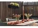 Close-up of a table setting with flowers and an outdoor table at 3534 Decatur St, Denver, CO 80211