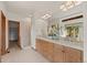 Well-lit bathroom with double vanity, spacious walk-in shower, and ample storage space at 91 Hess Ave, Golden, CO 80401