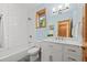Stylishly updated bathroom features white subway tile, contemporary fixtures, and a vanity with ample storage at 91 Hess Ave, Golden, CO 80401