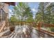 Inviting wooden deck surrounded by lush greenery and offering captivating views of the natural landscape at 91 Hess Ave, Golden, CO 80401