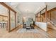 Elegant dining area with tray ceiling, wood beams, and views of the living room at 91 Hess Ave, Golden, CO 80401