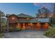 Exterior shot of a two-story home with solar panels on the roof at dusk at 91 Hess Ave, Golden, CO 80401