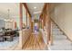 Inviting hallway with wooden beams, hardwood floors, and a staircase leading to the upper level at 91 Hess Ave, Golden, CO 80401