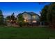 Spacious backyard featuring a deck with pergola and string lights, perfect for outdoor entertaining at 3970 White Bay Dr, Highlands Ranch, CO 80126